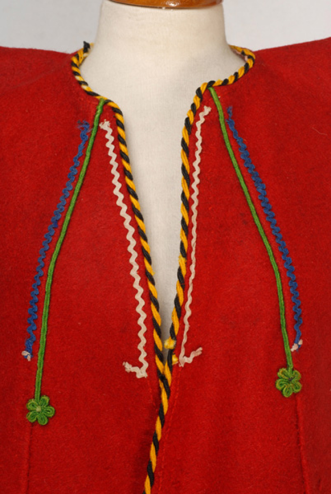 Detail of the applique decoration at the chest