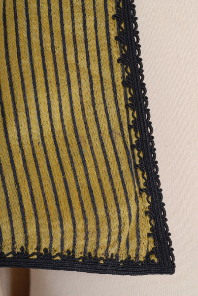 Front, detail of decoration, cord