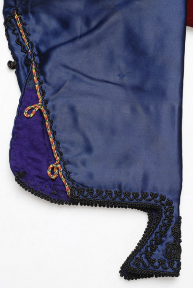 Limba (edge of the sleeve), detail of the decoration with black silk cordon 