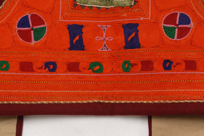 Back: moons, cross and bottom decoration
