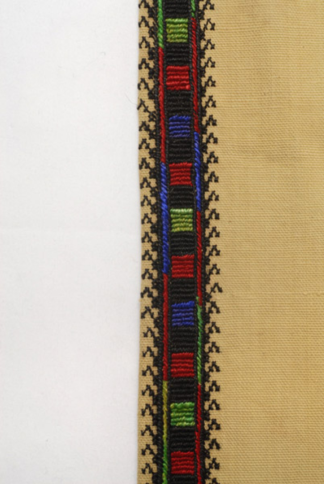 Seam of the sleeve, detail of the decoration with logadia and stavrovoulia