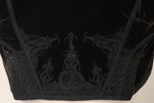Back, detail of the decoration (side and central motif)