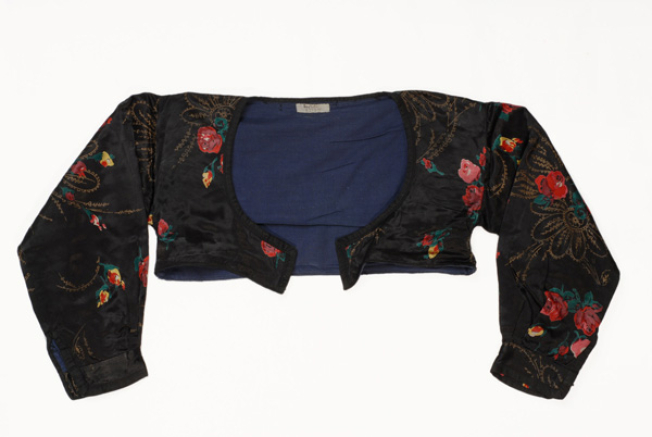 Koutsomango, short sleeved jacket made from printed satin fabric.