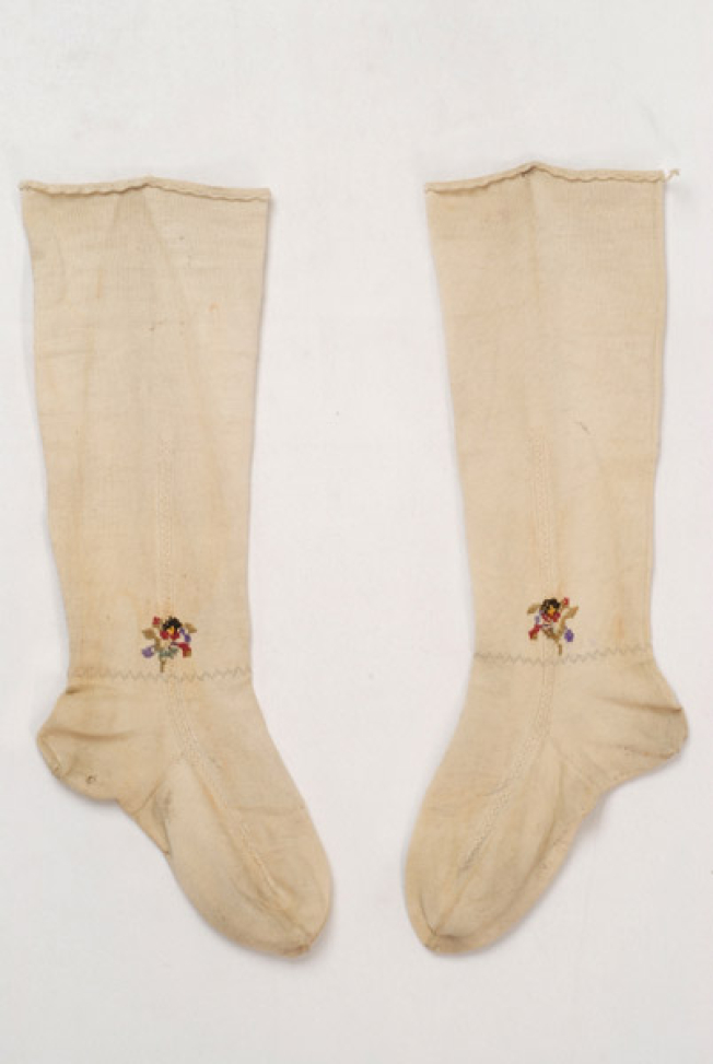 Stockings with ploumia (finery) at the ankle, outer side