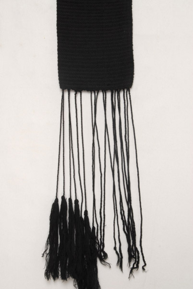 Detail of the embellished decoration and the fringed edge