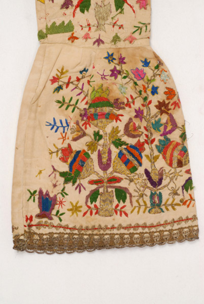 Undersleeve, detail of the colourful vegetal decoration
