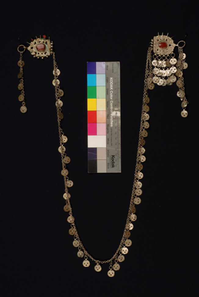 Paradenies me doulous, chained apron ornament with metal dentate sheets and doulous (hooks), ornamented with agetes