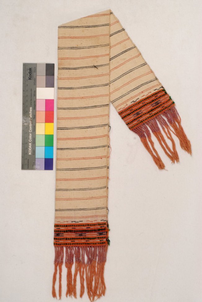 Karpa, white woven towel, with embellished coloured patterns at both sides and fringed edge 