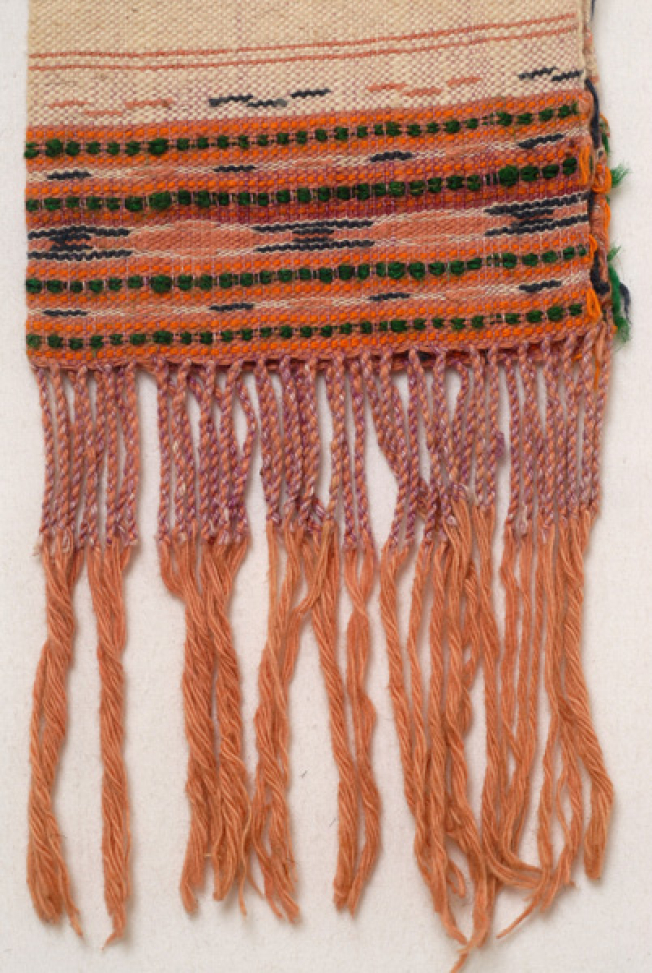 Edge of the towel, detail of the embellished multicoloured decoration