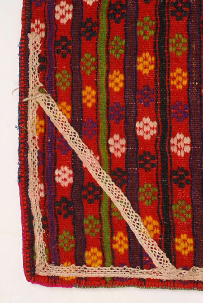 Corner of the apron: the decoration and detail of the fabric