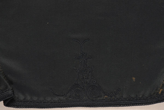 Back, detail of the decoration with black fine cordon