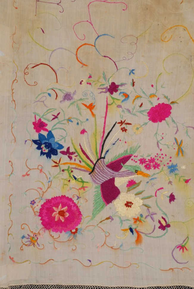 Detail of the decoration with multicoloured silk threads