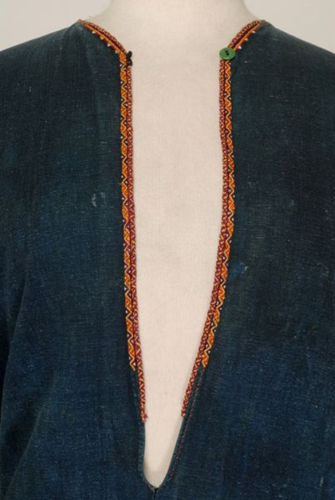 Detail of the decoration, limaria decorated with embroidered band and silk cordon