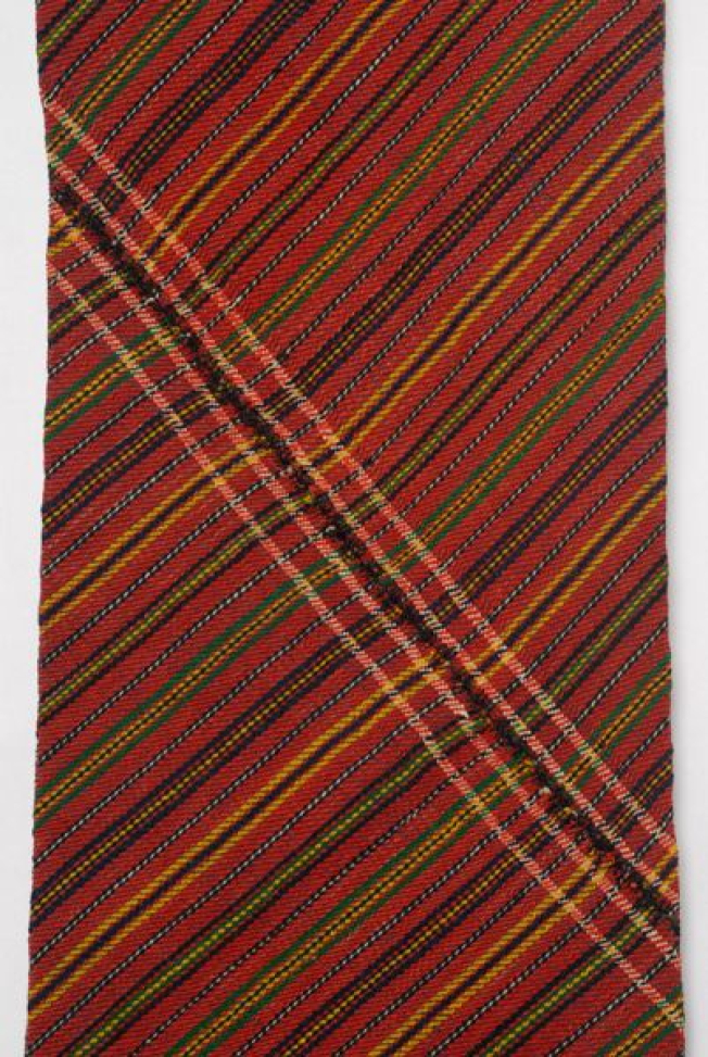 Detail of the decoration, embellished striped and mertza (embroidered joint)