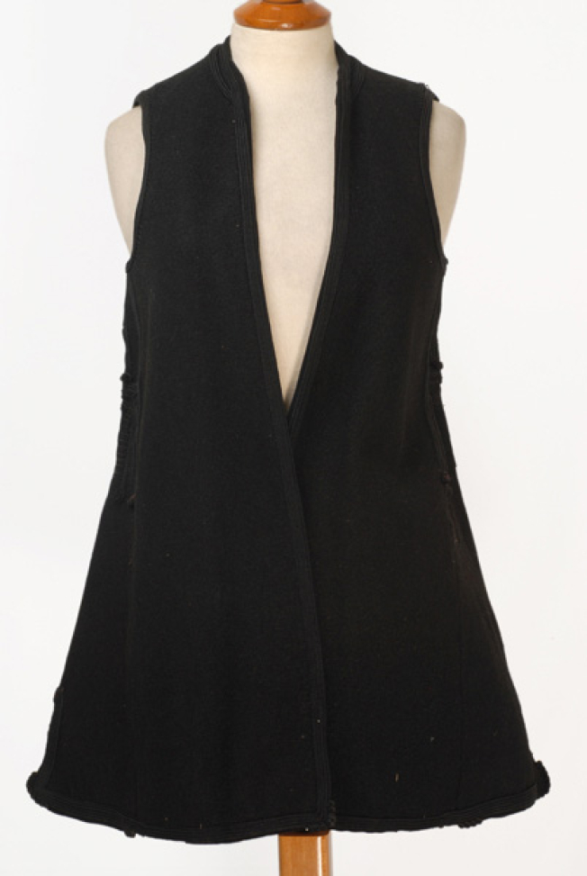 Woollen sigouna, sleeveless overcoat made of saddle blanket decorated with black woollen strimmata and cordons