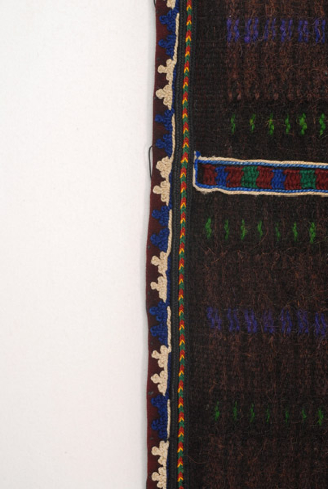 Selvages of the apron, detail of the applique decoration with cordons and felt bands with stylized vegetal decoration