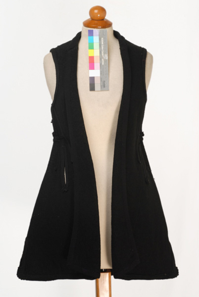 Woollen sigouna, sleeveless overcoat made of saddle blanket decorated with black woollen strimmata and cordons
