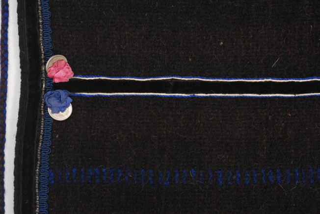 Horizontal joint, decoration with velvet band framed by silk cordons 