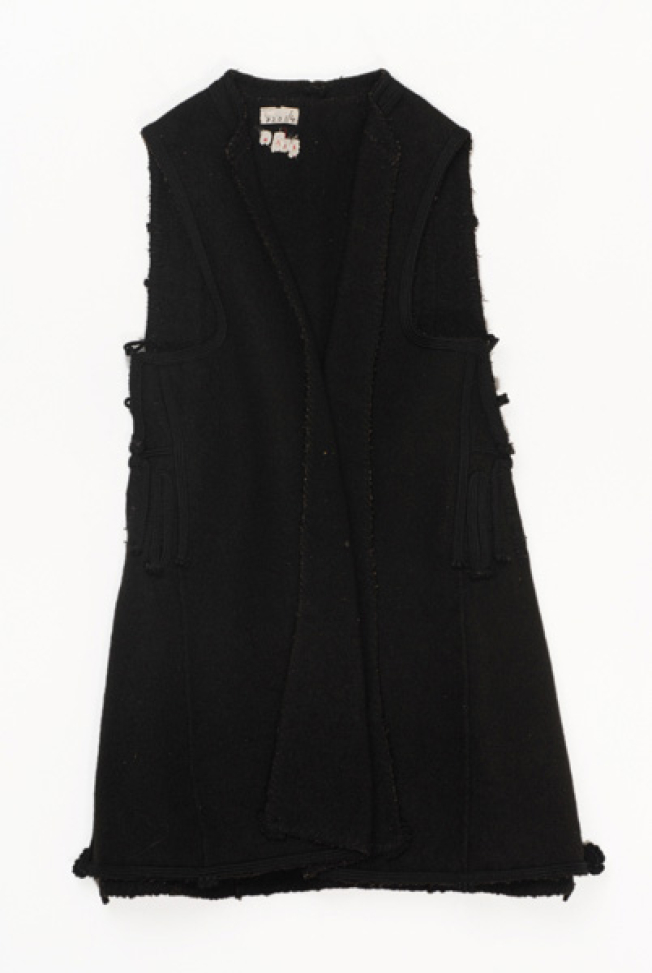 Woollen sigouna, sleeveless overcoat made of saddle blanket decorated with black woollen strimmata and cordons