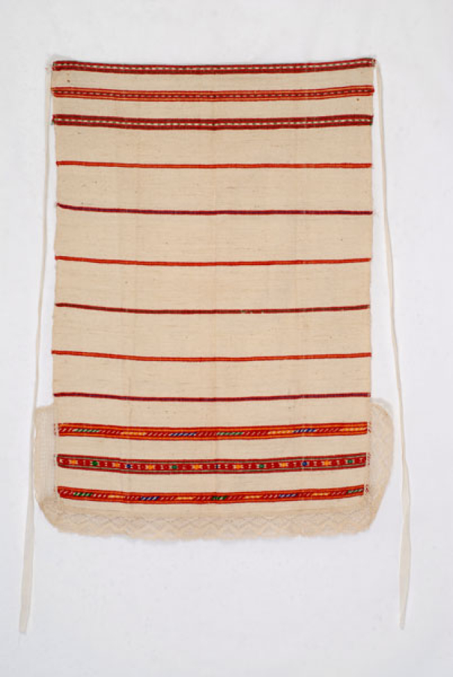 Striped cotton apron with ksombliasta (embroidered) geometric motifs for everyday use. Megara, Attica