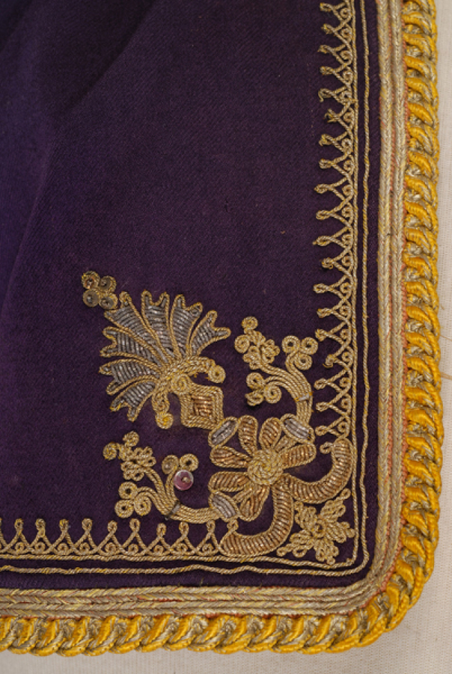 Front panel, detail of the decoration with gold thread and ti-tir (lustring)