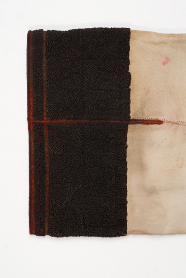 Detail of the embroidered decoration with rounded stitch at the sleeve border. Kanatia are divided into two katia with mitounia. (A)lyssiditsa can be seen at the joint of the panels