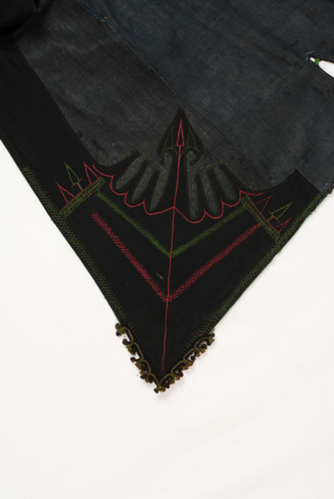 Detail of the embroidered decoration at skouta, the arrow of Alexander the Great on purchased black cotton fabric 