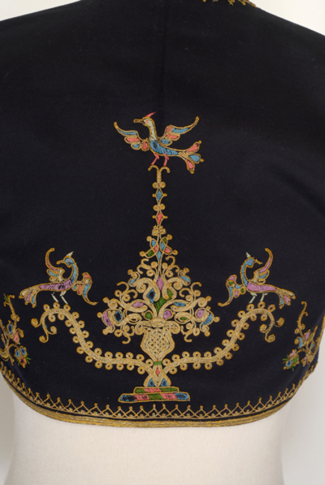 Back, detail of the gold embroidered decoration