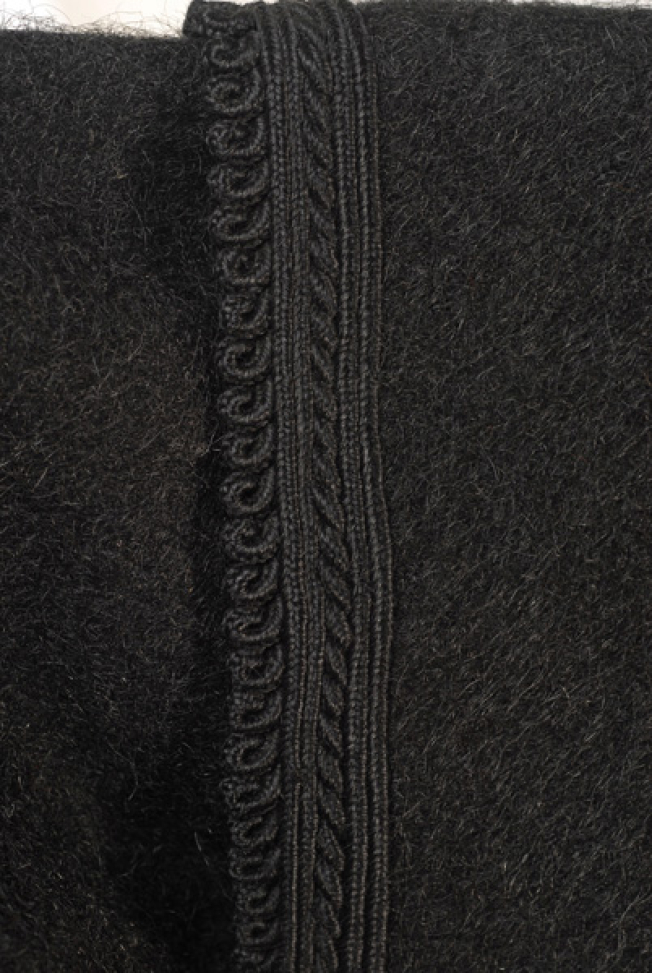 Sleeve, detail of the applique decoration with plain-coloured and loops 