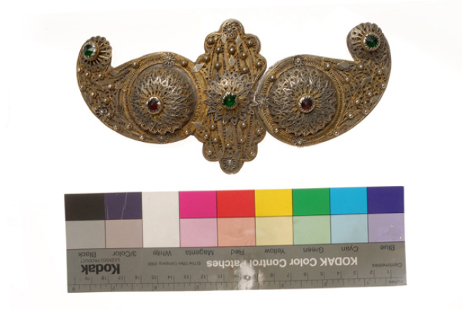 Gilded buckle with wiry multi-leafed rosettes and coloured glass stones 