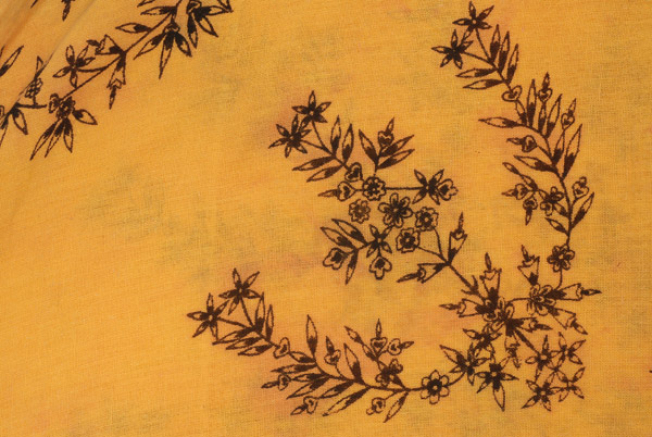 Detail of the printed decoration of the central kerchief, composition at the inner corner