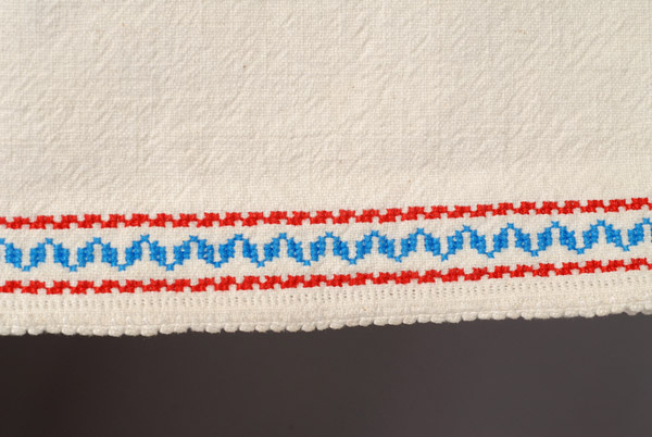 Sleeve: embroidery, flimsy decoration and bibila (crocheted lace) 