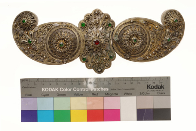 Gilded fine buckle with wiry multi-leaved rosettes and coloured stones