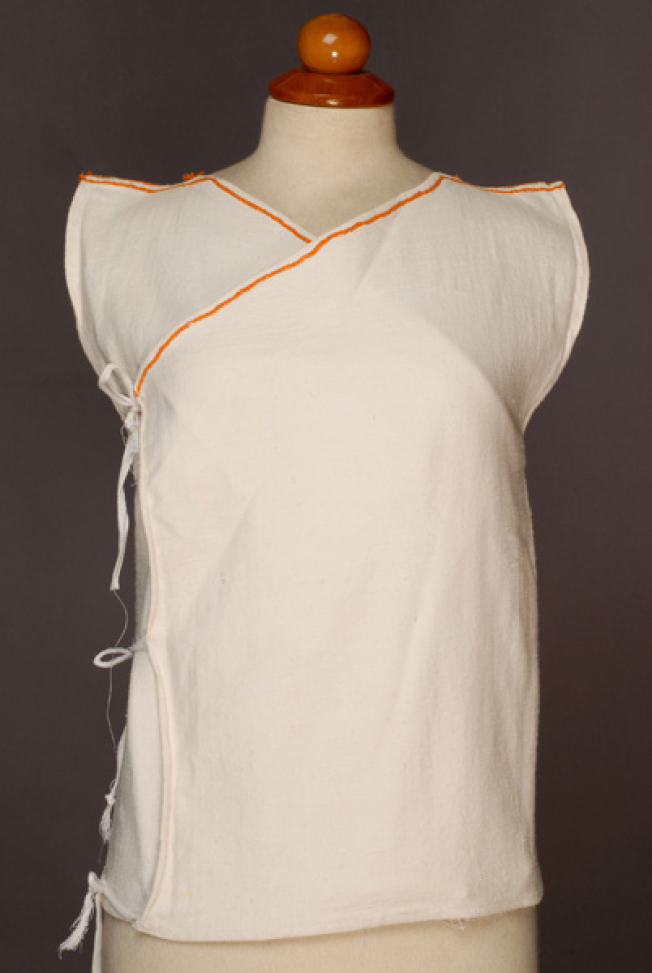 Zipouni, sleeveless double-breasted jacket made of white cotton fabric