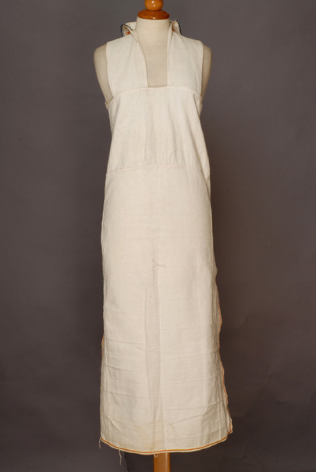 Poukamisa me tis podies, long outer cotton garment with large openings at the right and the left sides