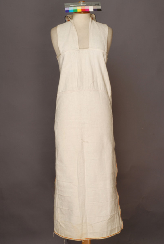 Poukamisa me tis podies, long outer cotton garment with large openings at the right and the left sides