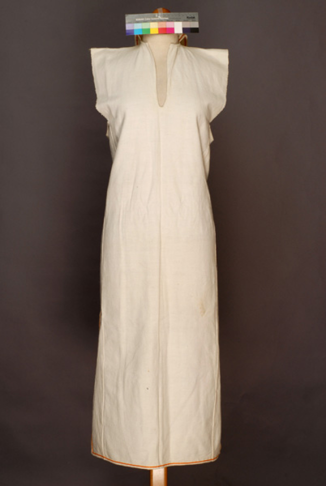 Poukamisa me tis podies, long outer cotton fabric with large openings at the right and the left sides