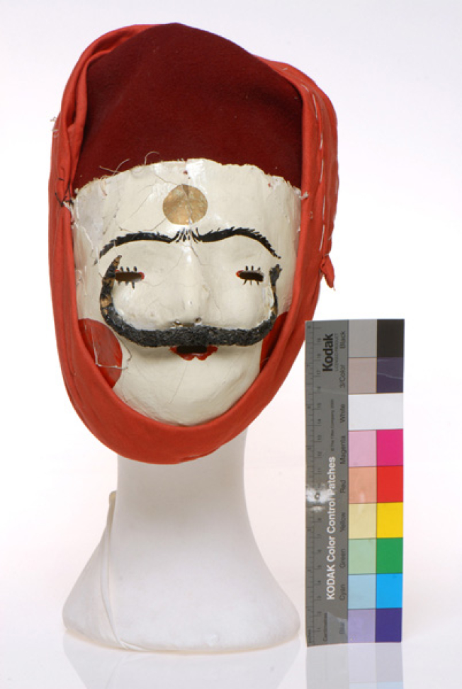 Prossopos, headdress with face cover made of plaster and wax and worn by Gianitsaroi during the carnival enactment of "Gianitsaroi and Boules" in Naousa