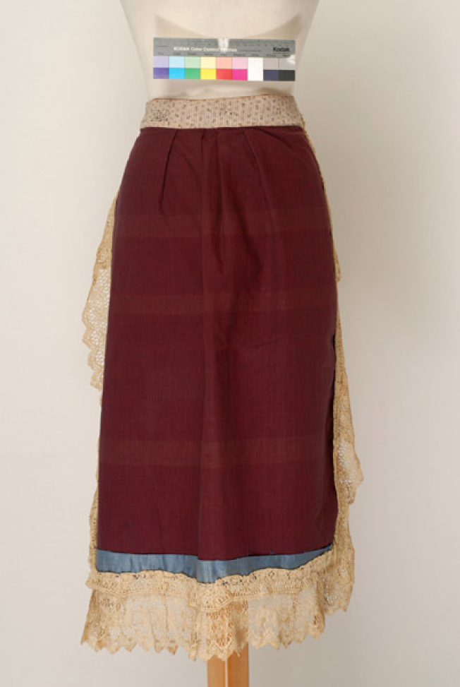 Velvet apron trimmed with lace sold by the metre