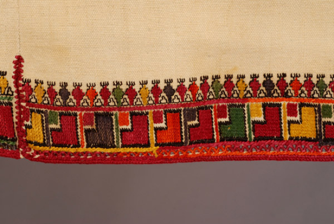 Sleeve border, detail of the geometric decoration
