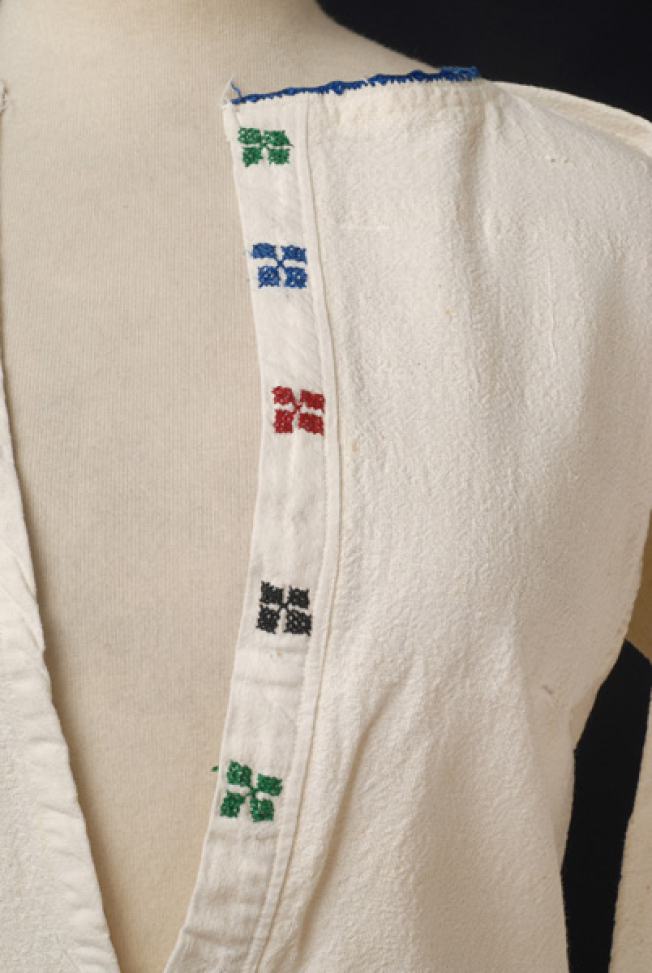 Detail of the embroidered decoration at the chest