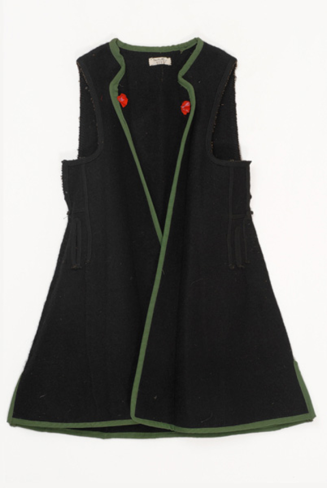 Woollen sigouna, sleeveless overcoat made of saddle blanket decorated with black woollen strimmata and two-coloured rosettes