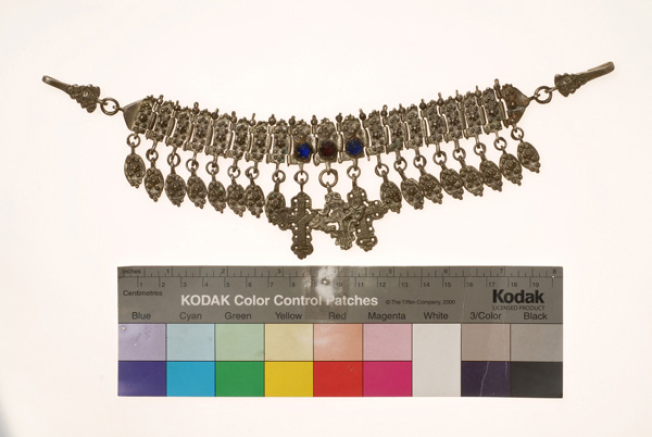 Giordani, silver ornament made of vertical cast talbets with grainy decoration and coloured glass stones.