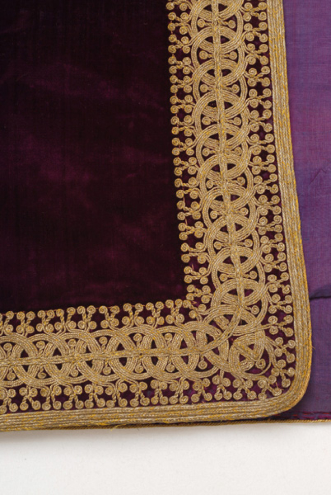 Detail of terzidikos (gold tailored) embroidery at the corner of the front panel