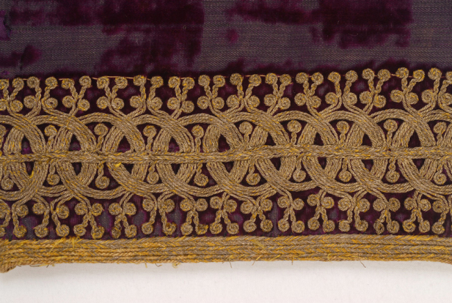 Detail of terzidikos (gold tailored) embroidery at the sleeve edge