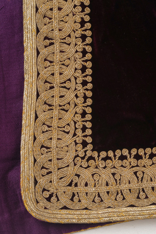 Detail of terzidikos (gold tailored) embroidery at the corner of the front panel