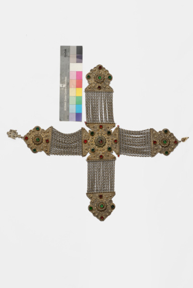 Gilded crossed kiousteki of the chest, with wiry decoration and coloured stones 