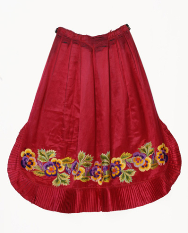 Satin apron in a warm shade of cherry embroidered with multicoloured silk threads