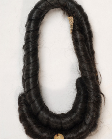 Perouklia or kossidia, two thick braids (kossa) arranged into a pattern. Accessory of an older style of bridal headdress from Metsovo