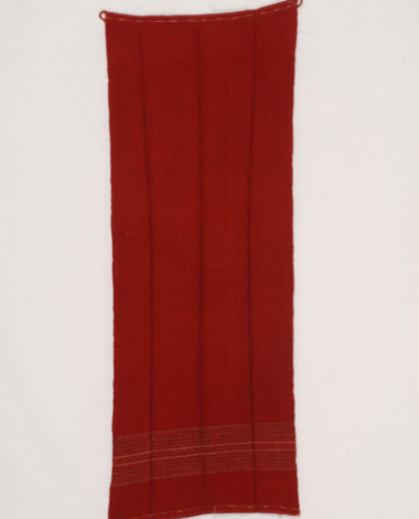 Red, hand-woven, wool apron with embellished stripes at the lower part
